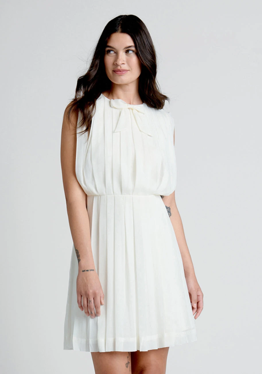 ModCloth Ivory Pleated Recycled Chiffon Mini Dress with Neck-Bow Detail 3 ModCloth Ivory Pleated Recycled Chiffon Mini Dress with Neck-Bow Detail